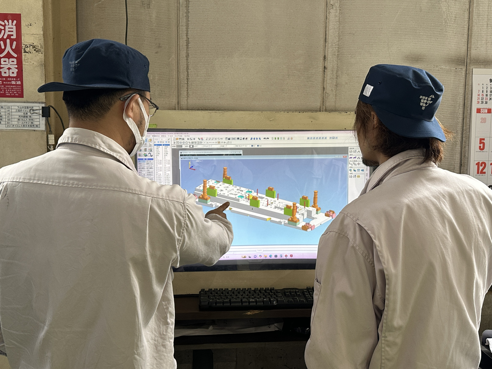 指導する従業員